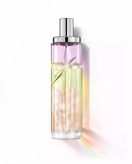 Yummy Swirl: tall bottle with purple, green and orange gradient on a white background.