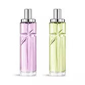 Starlicious the gourmet berry layering bundle packshot with Pistachio Praline and Berry Licorice, glass bottles with a carved shooting star, its facets shining bright beneath a sleek silver cap.