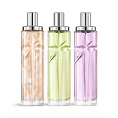 Starlicious the yummy swirl layering bundle packshot with Pineapple Musk, Pistachio Praline and Berry Licorice, glass bottles with a carved shooting star, its facets shining bright beneath a sleek silver cap.