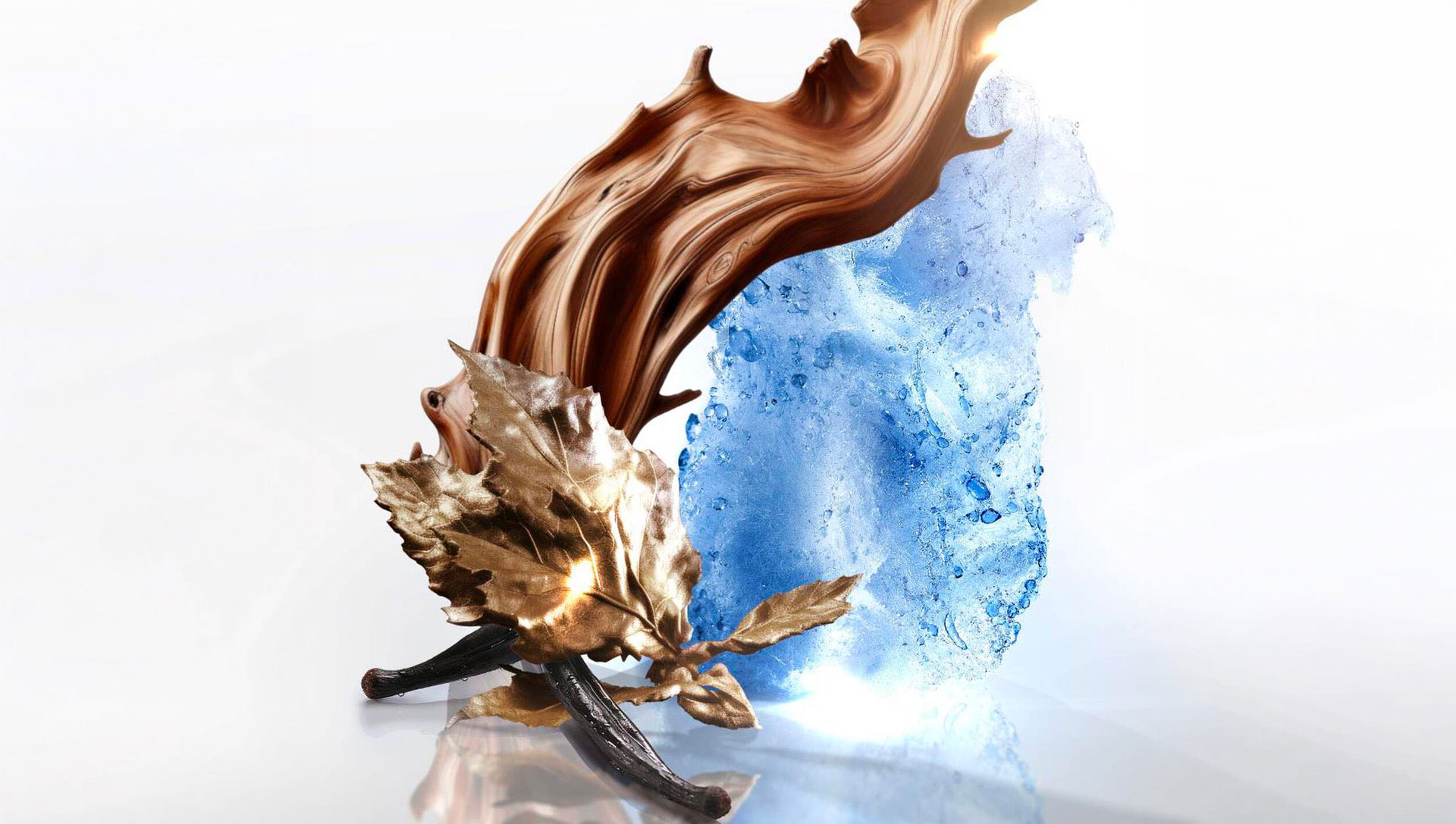 Praline accord and patchouli ingredient shot with golden caramel swirl and botanical elements, showcasing the warm gourmand base notes of Mugler Angel Perfuming Shower Gel