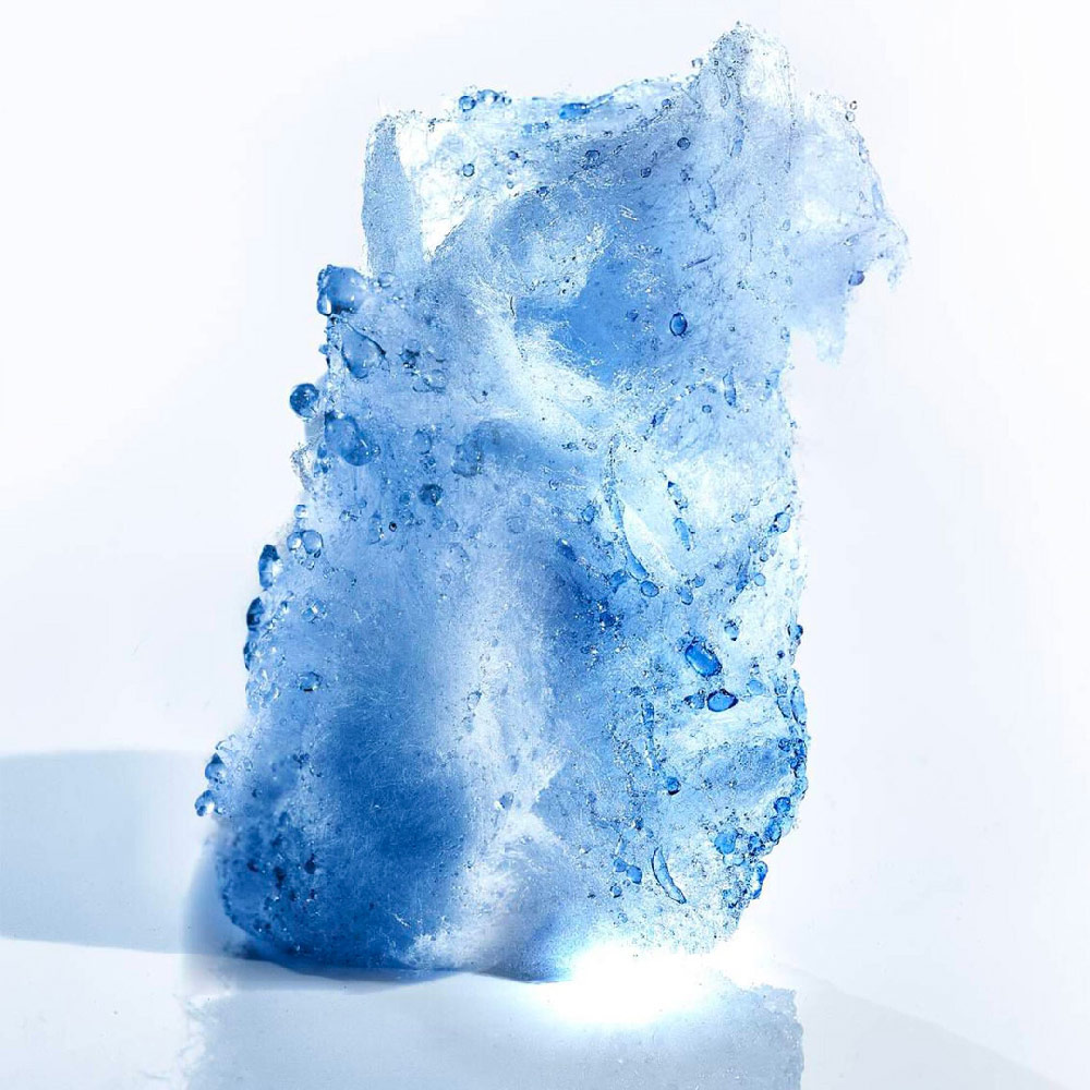 Blue crystal and mineral ingredient shot, showcasing the fresh and sparkling top notes of Mugler Angel Body Cream